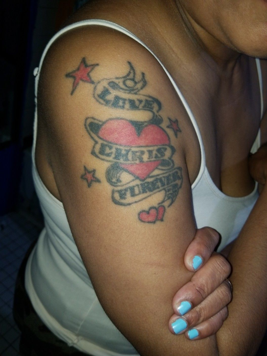 My wifes name over my heart  Couple name tattoos Wife tattoo Name  tattoos on arm