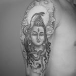 Tattoo byNathan Kostechko #NathanKostechko #favoritetattoos #favorite #best #cool #Shiva #hindu #snake #serpent #clouds #light #deity #God #flowers #floral #thirdeye #blackandgrey #fineline #portrait