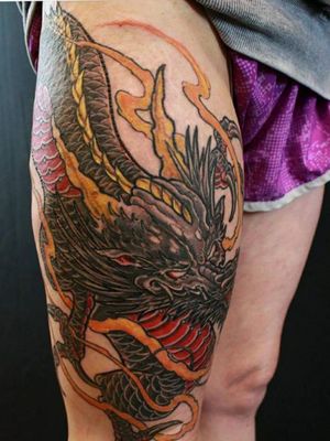 Custom 13 hour Dragon tattooed at The kansas city tattoo arts convention. 3rd place best color infused black and grey