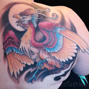 Phoenix tattoo by @jessevardarotattoos 