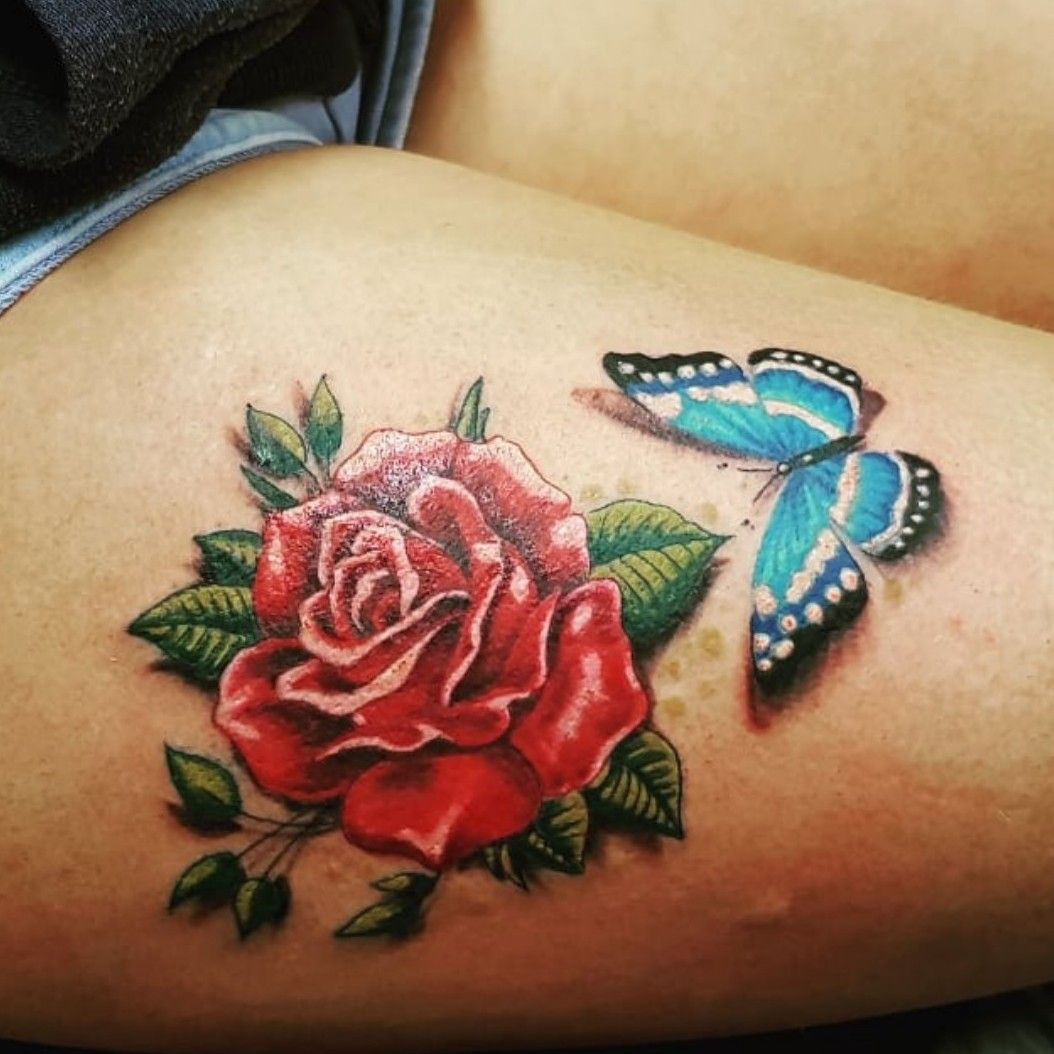 Blue and Red Rose Tattoo On Left Thigh