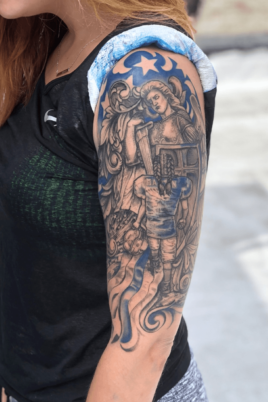 Discover 64 police st michael tattoo  incdgdbentre