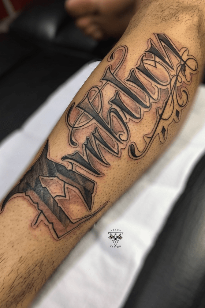 ambition tattoo on arm