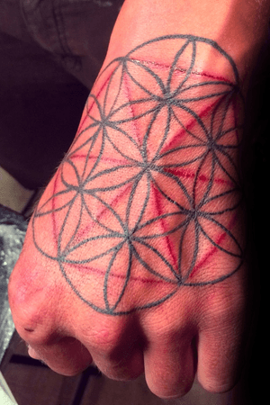 Fresh Sacred Geometry hand tattoo