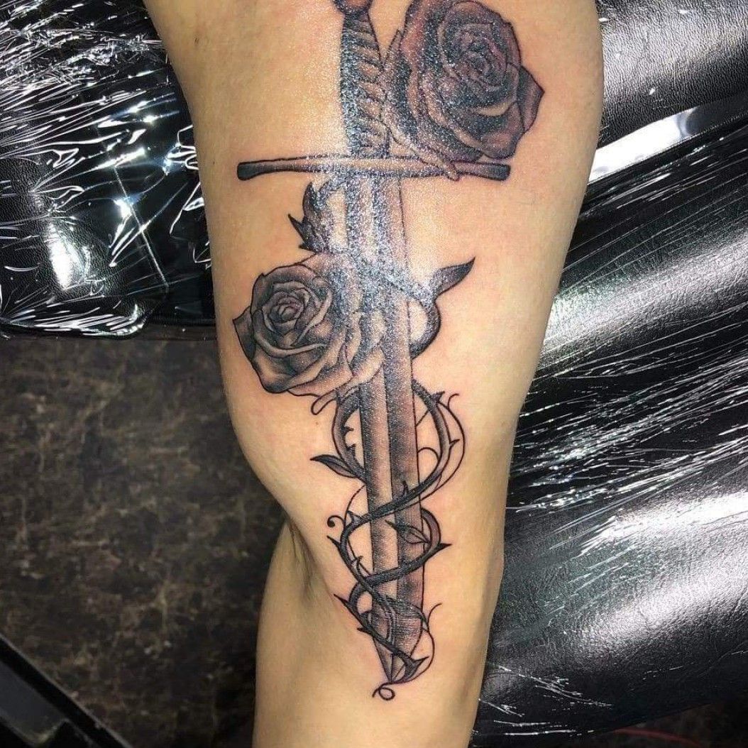 Sword  roses for John thanks  Backwoods Tattoo Studio  Facebook