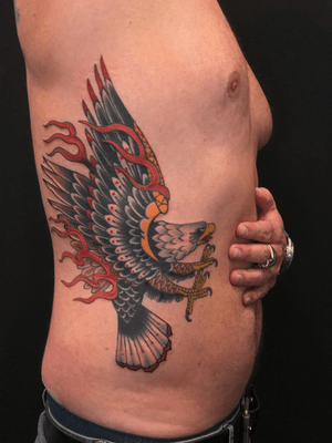 Traditional Eagle tattoo by Nate Fierro @natefierro #traditional #traditionaltattoo #eagletattoo #colortattoo #ribstattoo