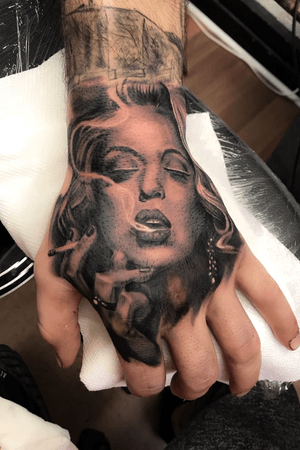 Marilyn Monrow Hand Tattoo Black and Grey