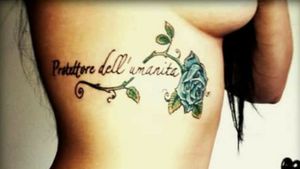 What Alexa means written in Italian on right side of ribs "Protector of mankind" #skankflanks #lettering #rose #sidepiece