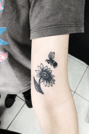 Sunflower and tinny bee