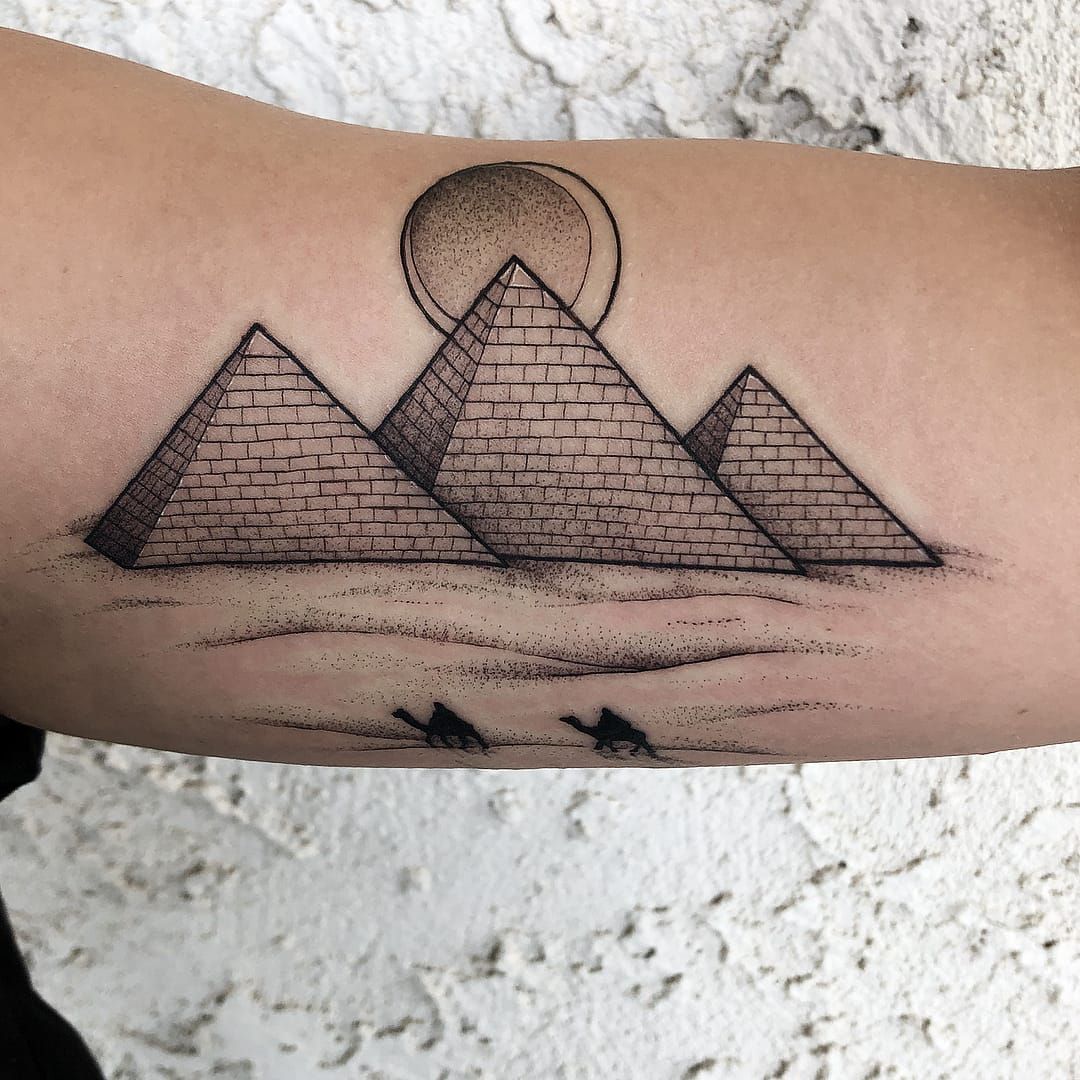 Pyramid tattoo on the right arm  Tattoogridnet