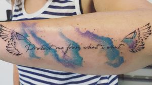 First tattoo since i'm in my own shop ! Watercolor, placebo's wings and lyrics. #watercolor #watercolortattoo #phrases #wings #placebo #blue #linework 