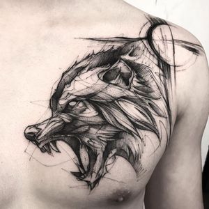 wolf side profile tattoo