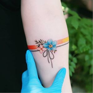 Tattoo by Tattooist Sion #TattooistSion #koreantattooartist #Korea #neotraditional #color #beautiful #knot #flower #folkart #ribbon #bow