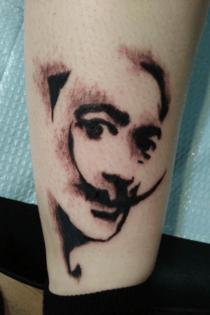 Banksy portrait of Salvador Dali on the back of my left leg (near the ankle)