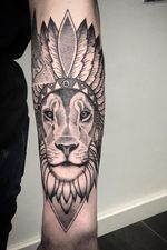 Geometric dotwork lion tattoo