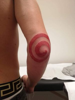 Spiral form the film "saw" elbow tattoo