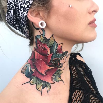 Tattoo by Karolina Wilczewska #karolinawilczewska #perfectlyplacedtattoos #placement #color #neotraditional #rose #snake #flower #floral #leaves #plant #nature