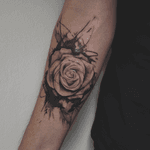 Another rose dropped at @Lacuna by me. I love mixing the spilled ink with a realistic piece. Feel free to hit me up if youd like a similar piece #tattoo #rose #rosetattoo #blackwork #realism #tattooroses 
