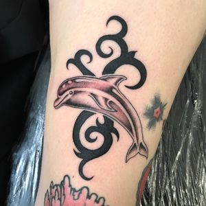 Tattoo by Sarah Schor #SarahSchor #blackandgrey #oldschool #tribal #dolphin #oceanlife #ocean #90s