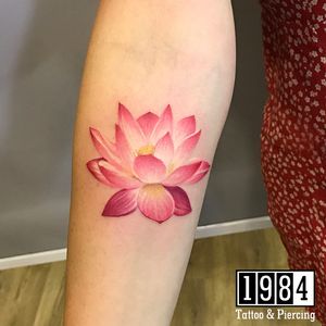 Anybody who has ever observed a lotus flower emerging from a murky pond cannot fail to see the beauty of this exquisite plant. The flower always looks so clean and pure against the background of the dirty pond. + Size: 6cm vertical + Time: 3 hours + Position: arm Tattoo by Artist Tung kem. ------------------ 1984 Tattoo & Piercing Studios 💻 Facebook: 1984 Tattoo Studio 💻 Instagram: 1984 Studios 💻 Website: 1984studio.vn 1️⃣ Studio Ha Noi: 🏠 Address: 📍35 Hang Buom, Hoan Kiem - 024 6657 8484 📍37 Ma May, Hoan Kiem - 024 6291 3784 📍41 Tay Ho, Tay Ho - 083 865 1984 📧 Email: booking.hanoi@1984studios.vn 📧 Email: booking.tayho@1984studios.vn 2️⃣ Studio Hoi An: 🏠 Đia chi: 📍274 Cua Dai, Cam Chau - 023 5654 1984 📧 Email: booking.hoian@1984studios.vn