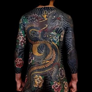 Tattoo by Horitoshi #Horitoshi #dragontattoos #dragon #mythicalcreature #legend #folklore #color #irezumi #Japanese #peony #smoke #flowers #floral #chrysanthemum