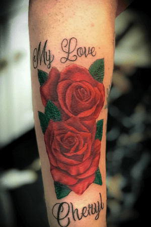 Roses tattoo by Roger.