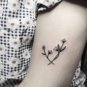 Elegance ❤️Instagram: @nikita.tattoo#inked #smalltattoo #minimalism #minimalistictattoo #linework #lineworktattoo #blackworker #blackwork #floral #floraltattoo #flowertattoo #flowers #details #minimalistic #thinlinetattoo #fineline #dotwork 