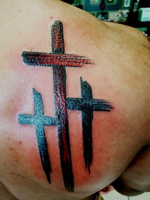 Three crucifixes brush strokes