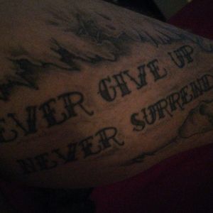 Never give up of tattoos and never surrender for to pain 