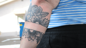 Line work centric stylized floral armband by David Narvaez