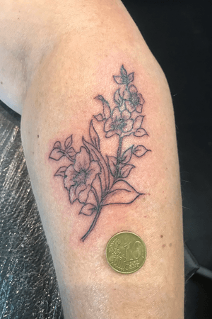 Small flower tattoo