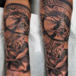 Black and grey realism tattoo with a open faced clock and rose on the forearm. 