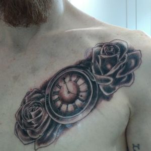Timepiece and two roses