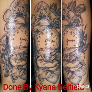 A simple clock and rose tattoo, she didn't want too much dark shading. 