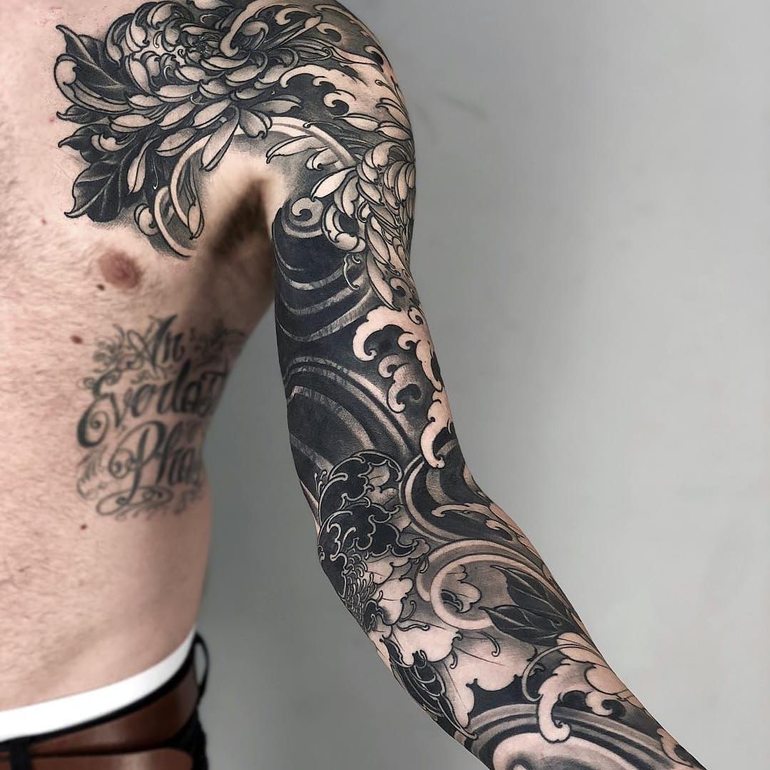 japanese wave and flower tattoos