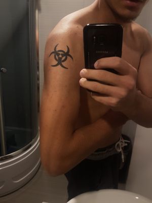 HELP, i did this tattoo without realizing people in the LGBT community use it to show they have HIV, now i need help on ideas on how to cover this tattoo up 
