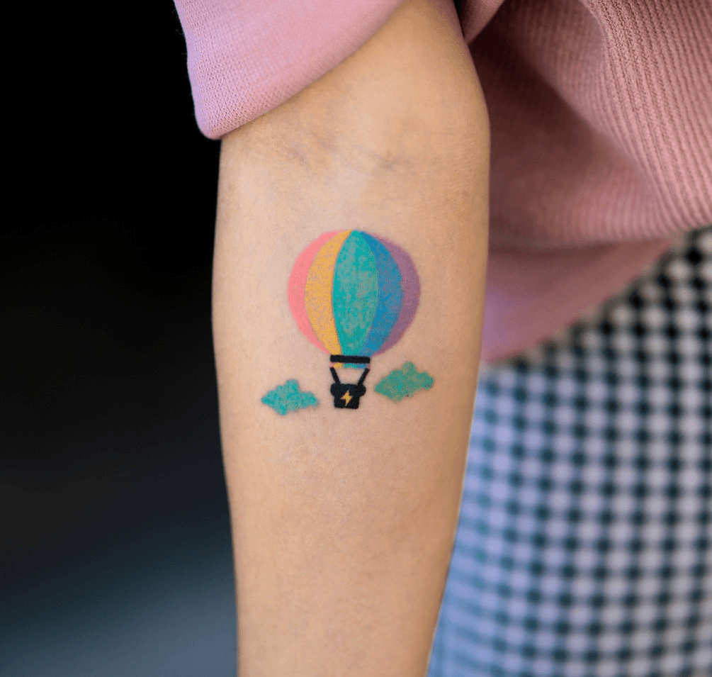 Tiny Hot Air Balloon Tattoo On Leg