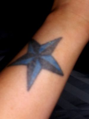 This was my first ink. I chose to have it on my top left front fourarm just above my wrist . got it for my 21st. It got badly infected and i had lost a good portion of color had it re-touched and 8yrs later this is the product. Looking to add a few lil stars around it one for each my kiddos...