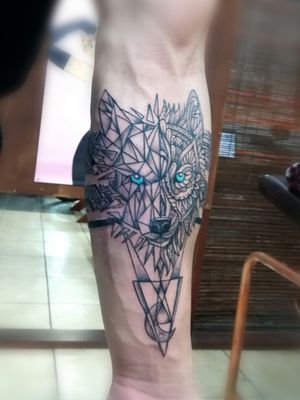 Wolf and bands designed and inKed by K #tattoo #ink #tatttoos #worldfamousink #eikondevice #greenmonster #tattooaddictsouthafrica #gunwax #thelightningstation #tam #tattoodo #inkbe #wolftattoo #geometrictattoos #mandala #wolf #blueeyes