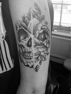 Skull / flower peice on arm