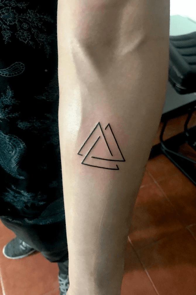Tattoo uploaded by David Gafita • #triangle #triangletatoo #geometric # triangles #minimalist Triangle Tattoo Meaning Other than the holy trinity,  the triangle tattoo has been used to represent a variety of other trinities.