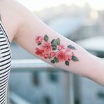 Flowers on her arm.#tattoo #Korea #tattooart #koreatattoo #koreatattooist #flowertattoo #illustration #birthflowertattoo #tattooistartmag #hongdae #flowers #coloredtattoo #watercolortattoo #hongdaetattoo #norigae #tattooistsion 