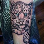 Realistic leopard tattoo 