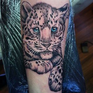 Realistic leopard tattoo