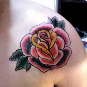 Traditional Rose tattoo for her••••••••#traditionaltattoo #rosetattoo #color 