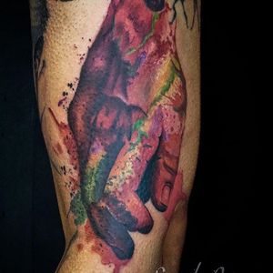 Get a stunning illustrative hand tattoo on your arm in London, GB, done in a beautiful watercolor style.