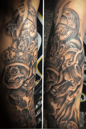 Skull and car parts tattoo done on sholder 