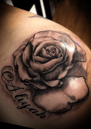 Rose tattoo done on a sholder 