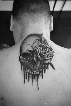 Skull melting with rose 