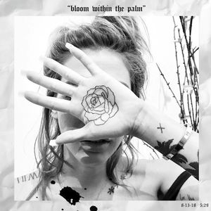 BLOOM WITHIN THE PALM